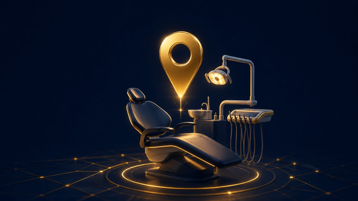 Cadeira odontológica com um pino de localização dourado acima — como atrair pacientes para o consultório